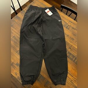 New Nike Youth Track Pants Large Black Jogger Mesh Side Zip Vents Oversized $70!